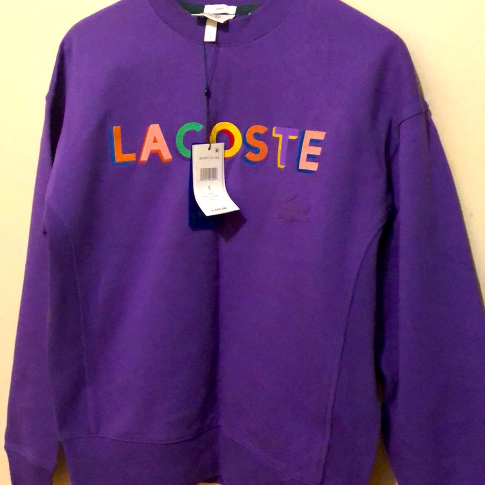 Lacoste unisex size small purple with a colorful Lacoste lettering Sweatshirt